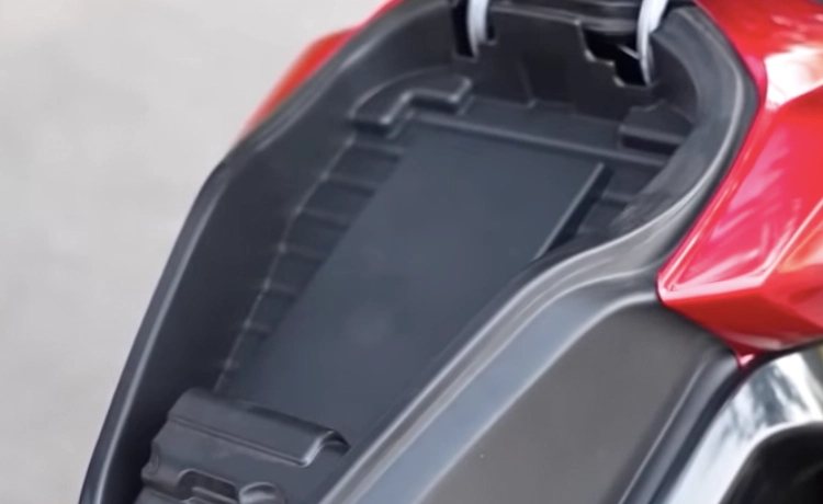 Under-seat charging compartment